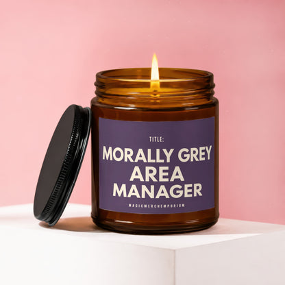 Amber jar candle lit, with lid askew, labeled "Morally Grey Area Manager".