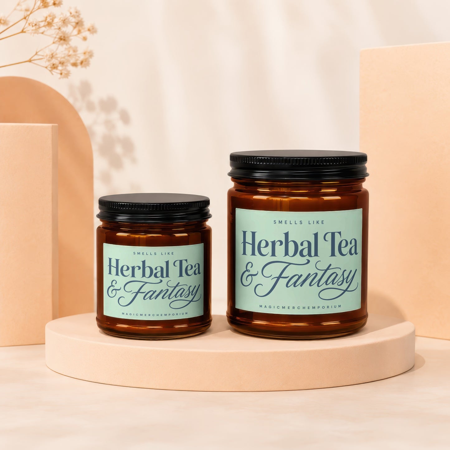 Two amber glass jars labeled "Herbal Tea & Fantasy" with black lids.