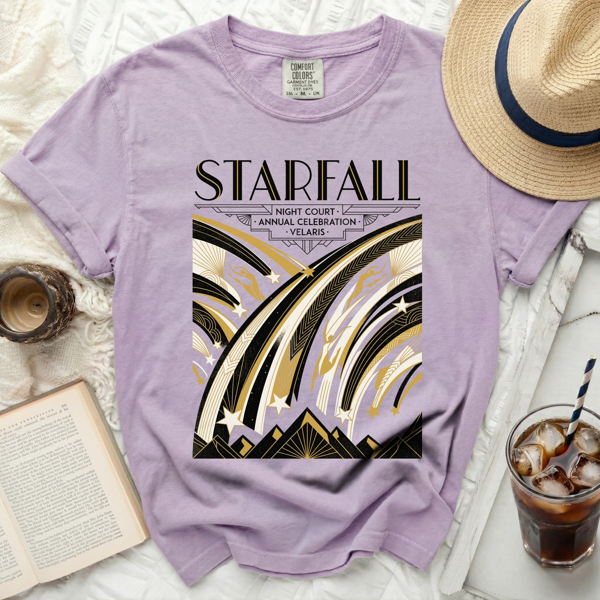 Purple t-shirt with "Starfall Night Court Annual Celebration Velaris" graphic.