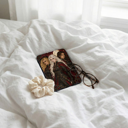 Three illustrated women on a dark patterned surface with glasses and scrunchie on white sheets.