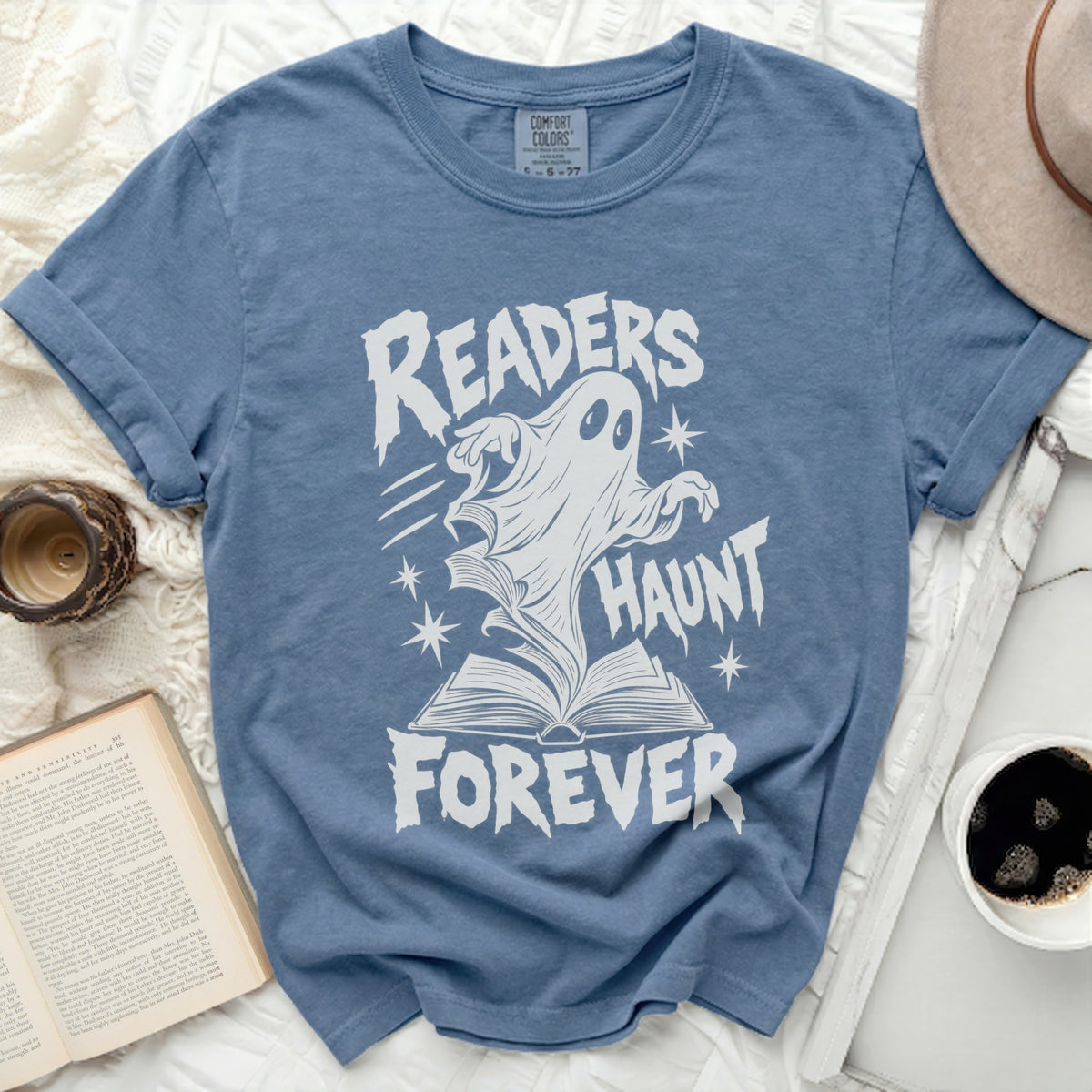 Blue t-shirt with white text and ghost graphic reading "Readers Haunt Forever".