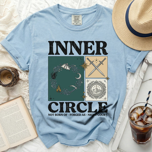Light blue t-shirt with "INNER CIRCLE NOT BORN OF FORGED AS NIGHT COURT." graphic.