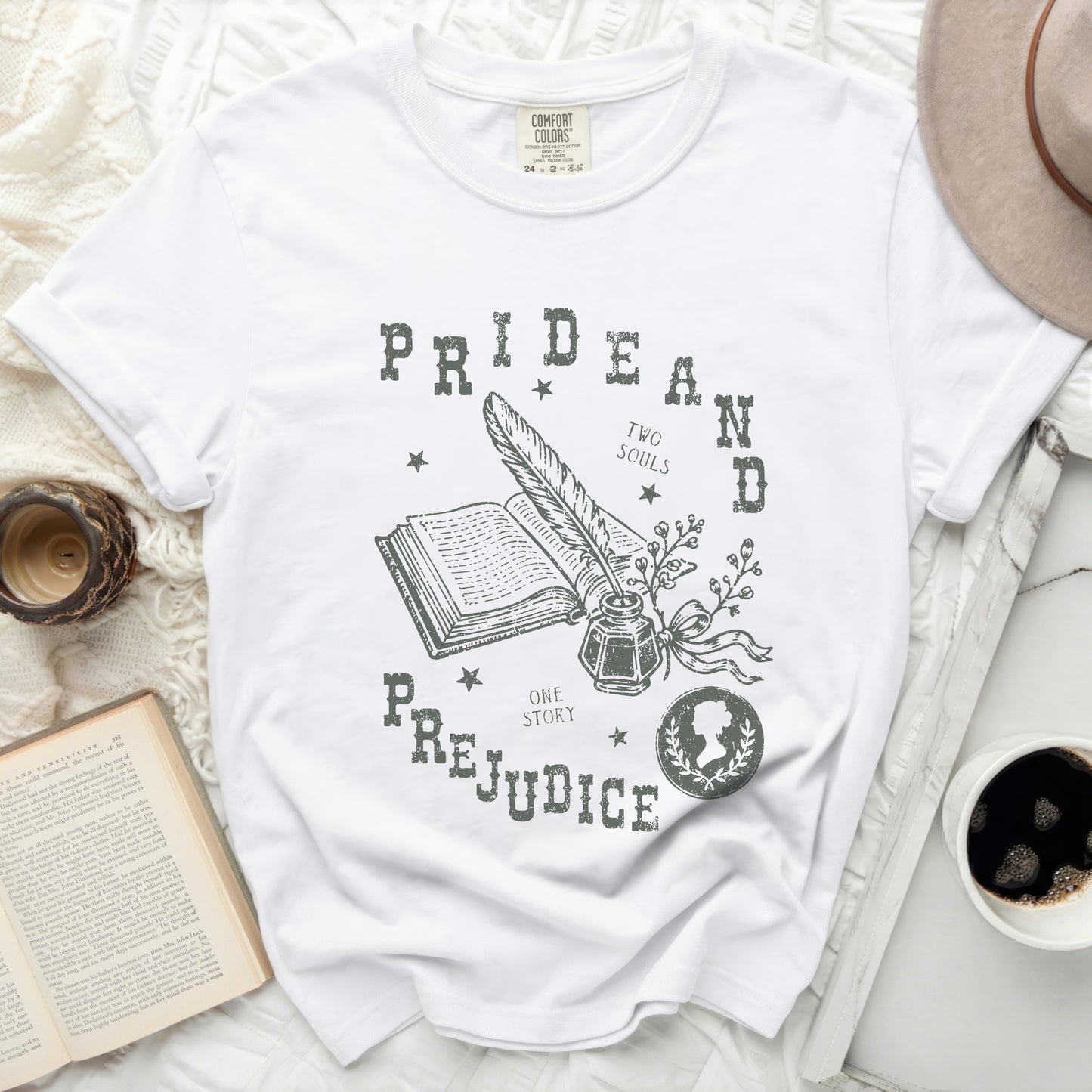 White t-shirt with "Pride and Prejudice, Two Souls, One Story" graphic.