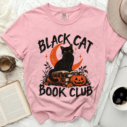 Pink t-shirt with "Black Cat Book Club" text and graphic.