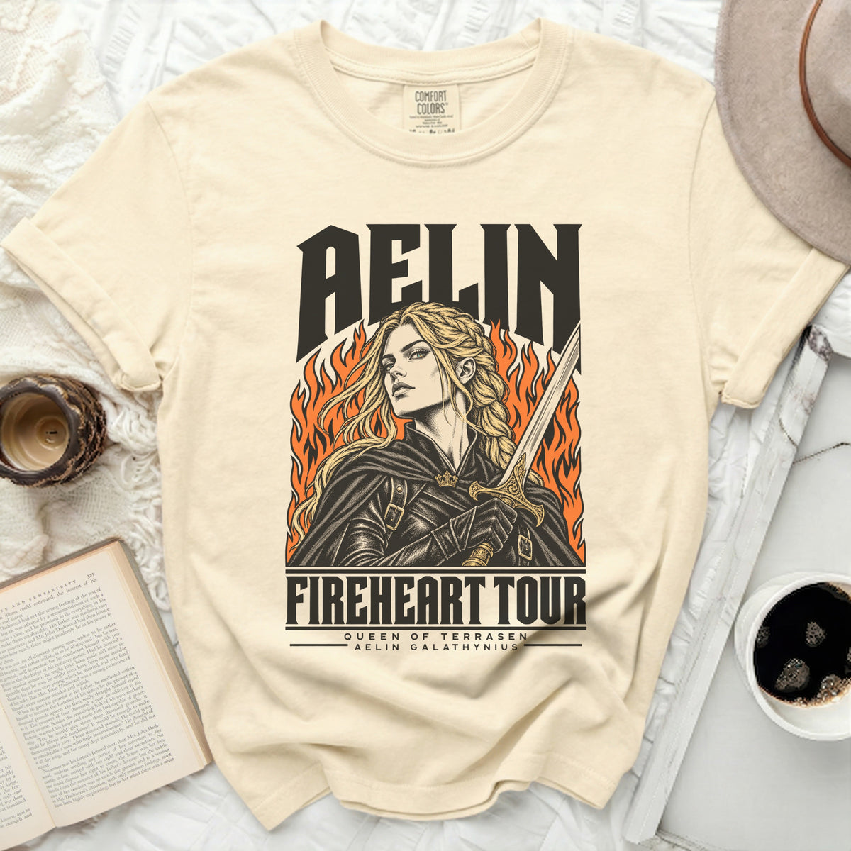 Cream t-shirt with Aelin Fireheart Tour graphic and lettering.
