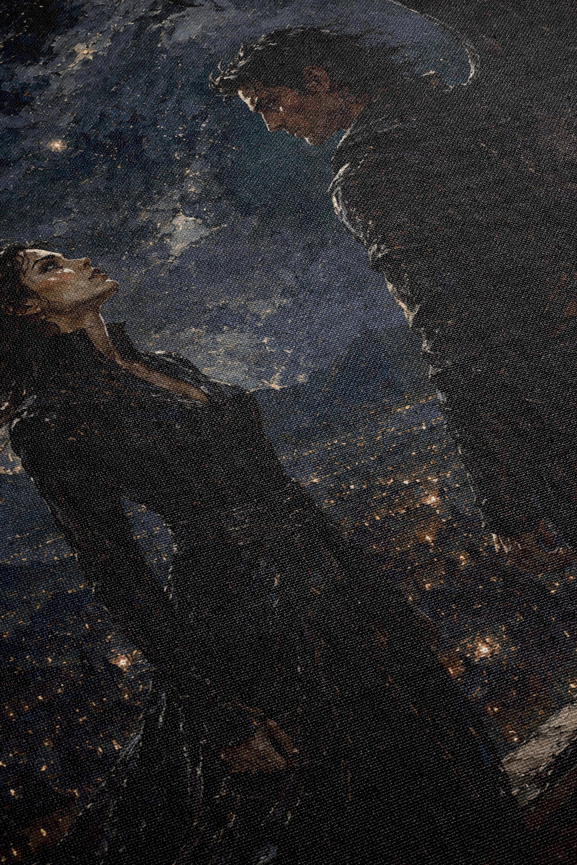 a woman and a man standing together in a dark, nighttime setting, with the woman looking up at the man.