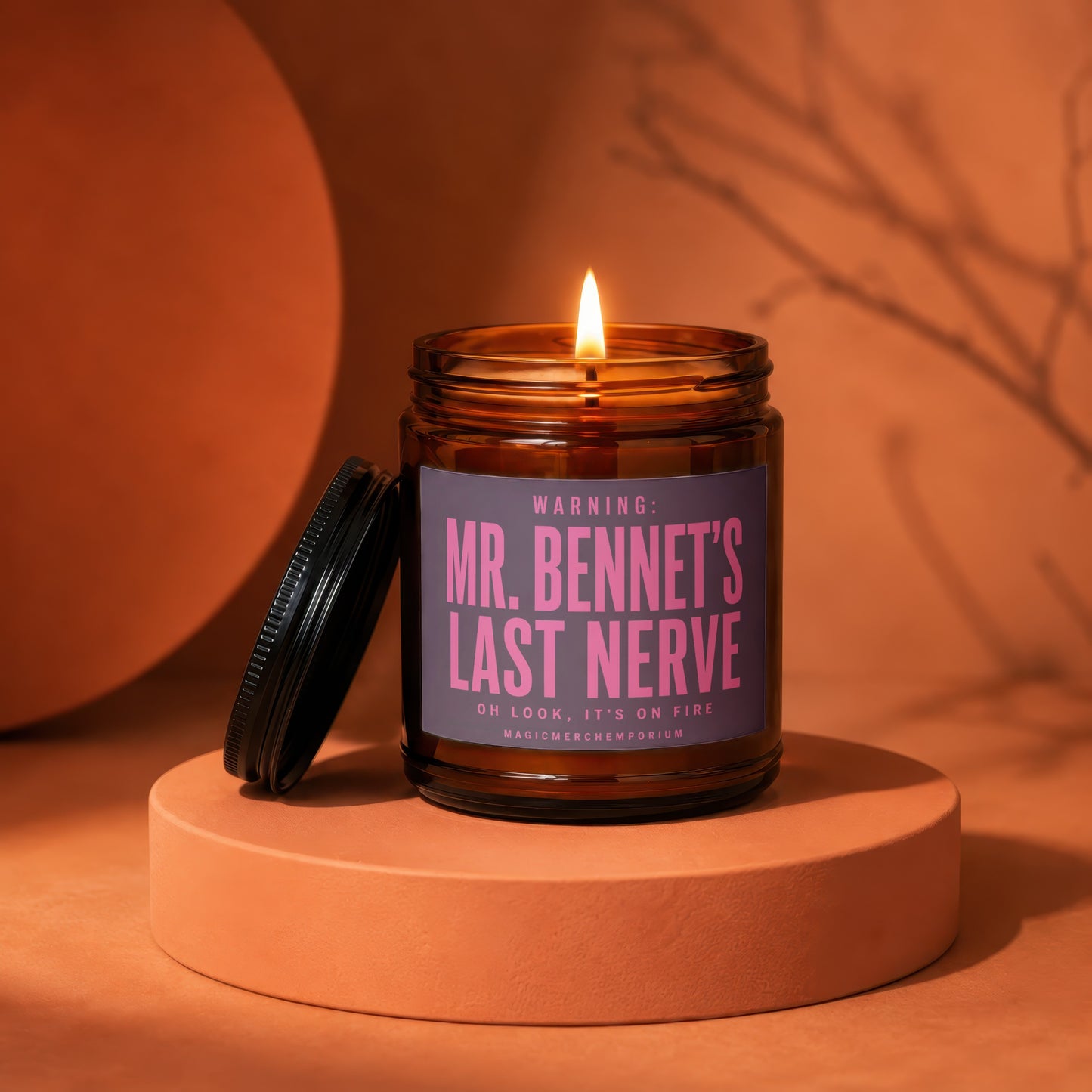 Amber jar candle lit with "WARNING: MR. BENNET'S LAST NERVE" text.