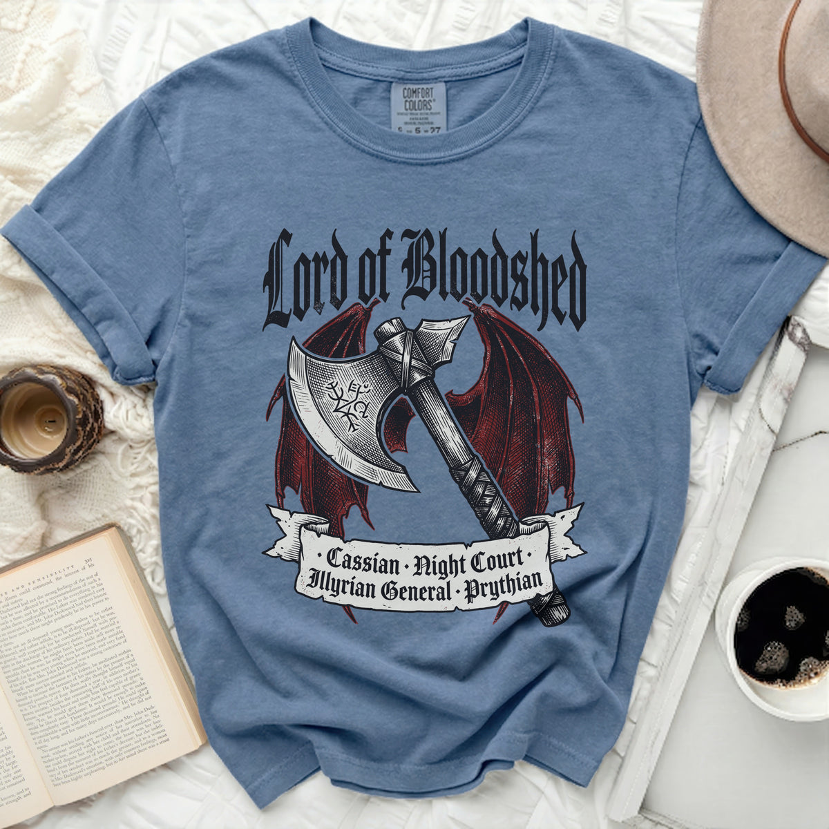 Blue t-shirt with "Lord of Bloodshed" and axe artwork.
