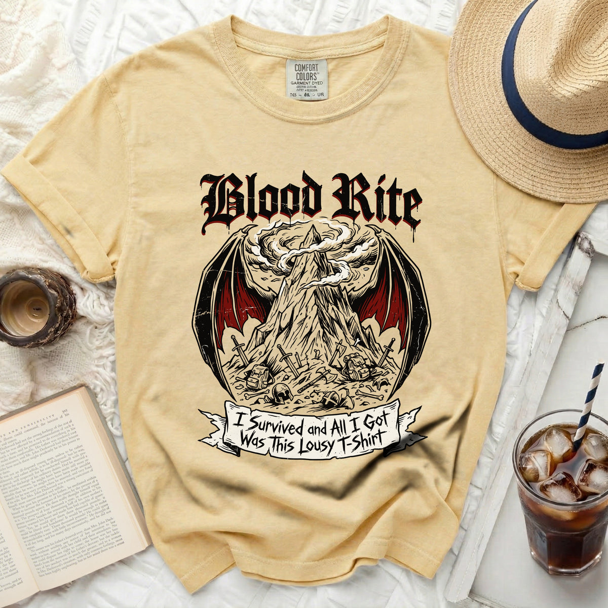 Yellow t-shirt with "Blood Rite" and graphic, "I survived and all I got was this lousy t-shirt".