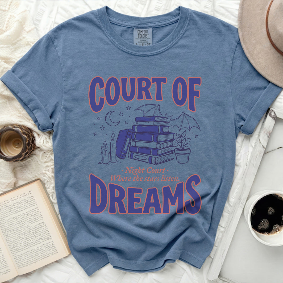 Court of Dreams t-shirt with books, candles, moon, and bat design.