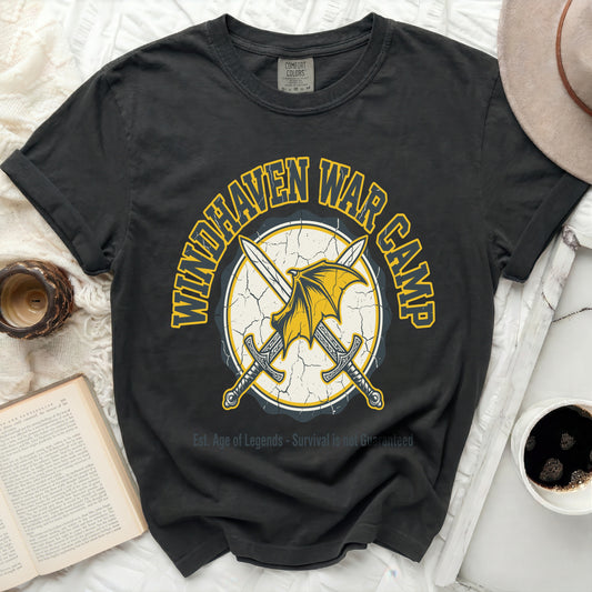 Dark grey t-shirt with "Windhaven War Camp" text and crossed swords graphic.