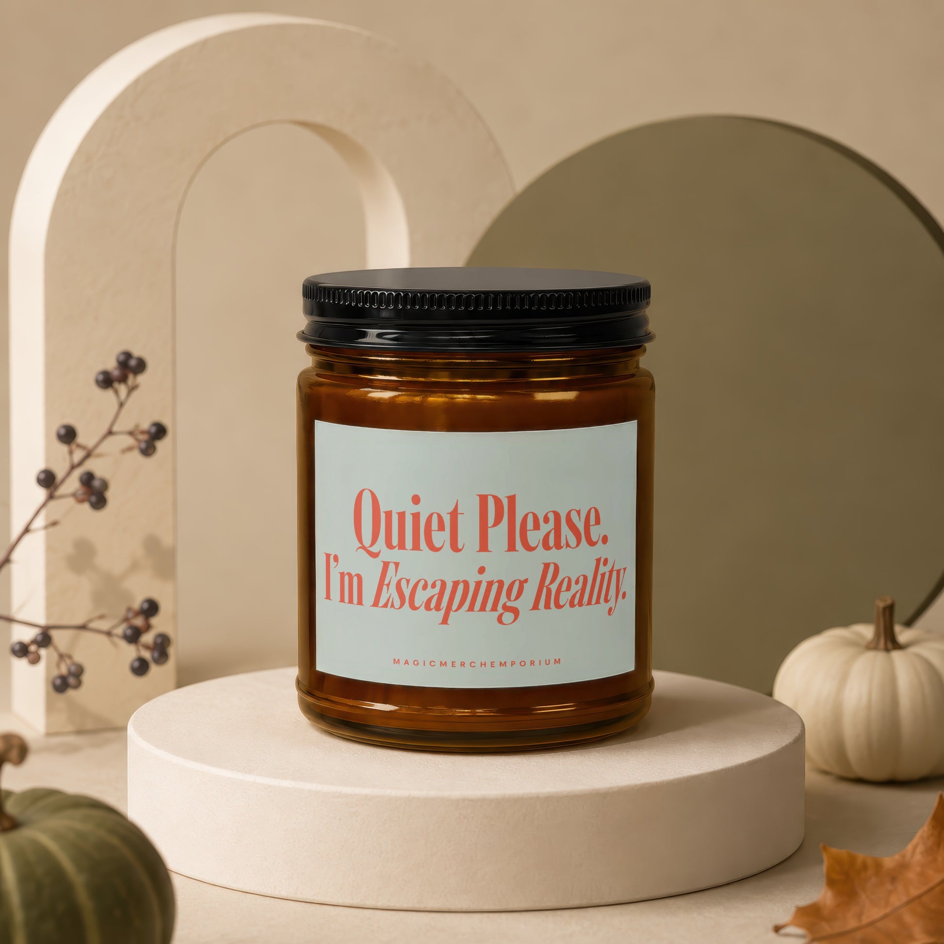 Candle with text "Quiet Please. I'm Escaping Reality." on a display stand.