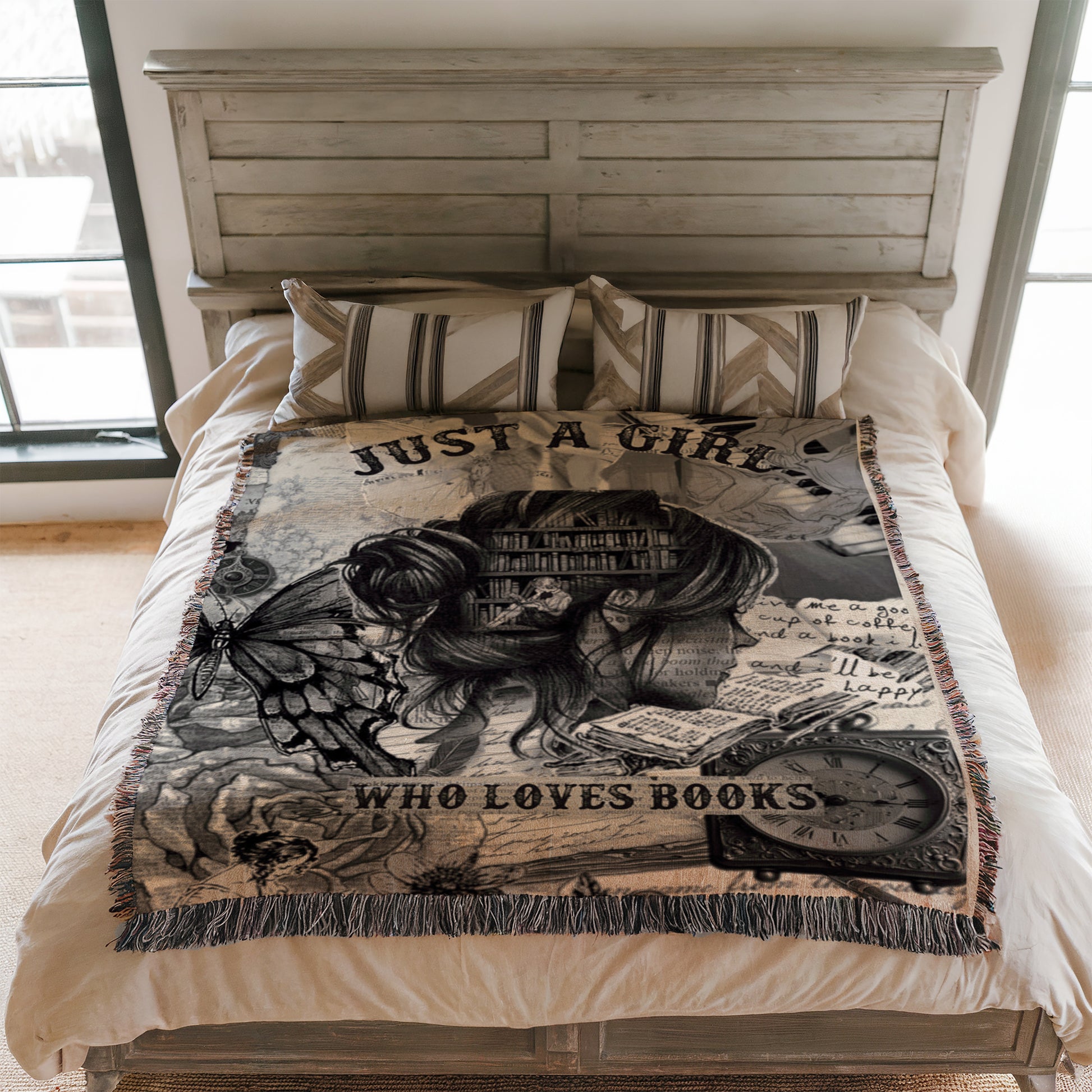 a bed with a blanket that has a book-themed design. The blanket has a butterfly and a book illustration, along with the text "Just a girl who loves books".