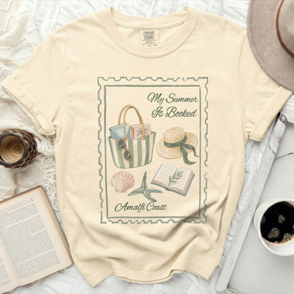 T-shirt with "My Summer Is Booked Amalfi Coast" graphic and travel icons.