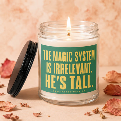 Candle with text "The Magic System Is Irrelevant. He's Tall." and logo "MagicMerchEmporium".