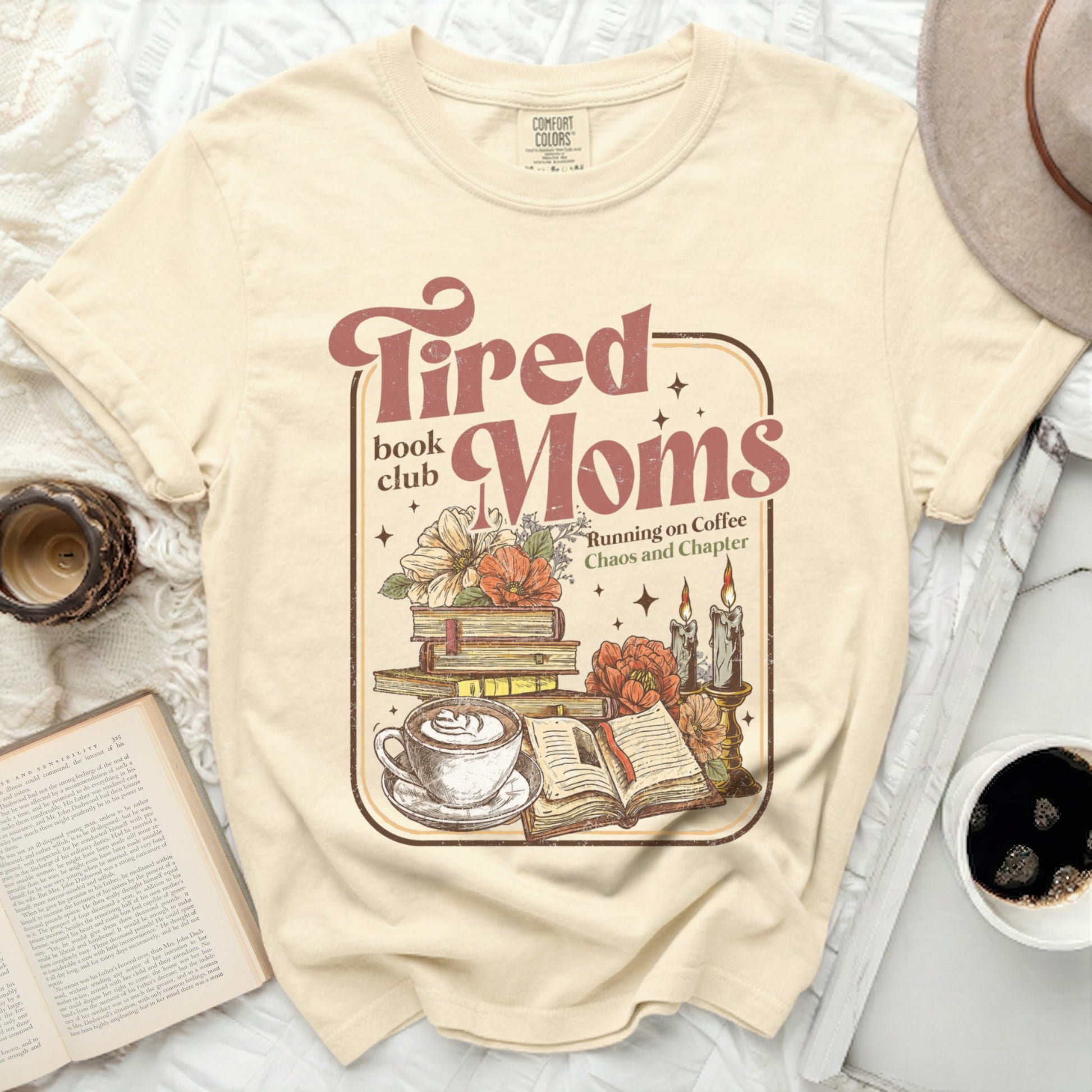 Tired Moms book club graphic with books, coffee, and candles.