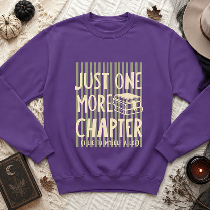 Purple sweatshirt with "Just One More Chapter (I lie to myself a lot)" text and book graphic.