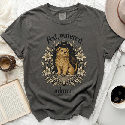 Gray t-shirt with a dog illustration and text "Fed, watered, adored."