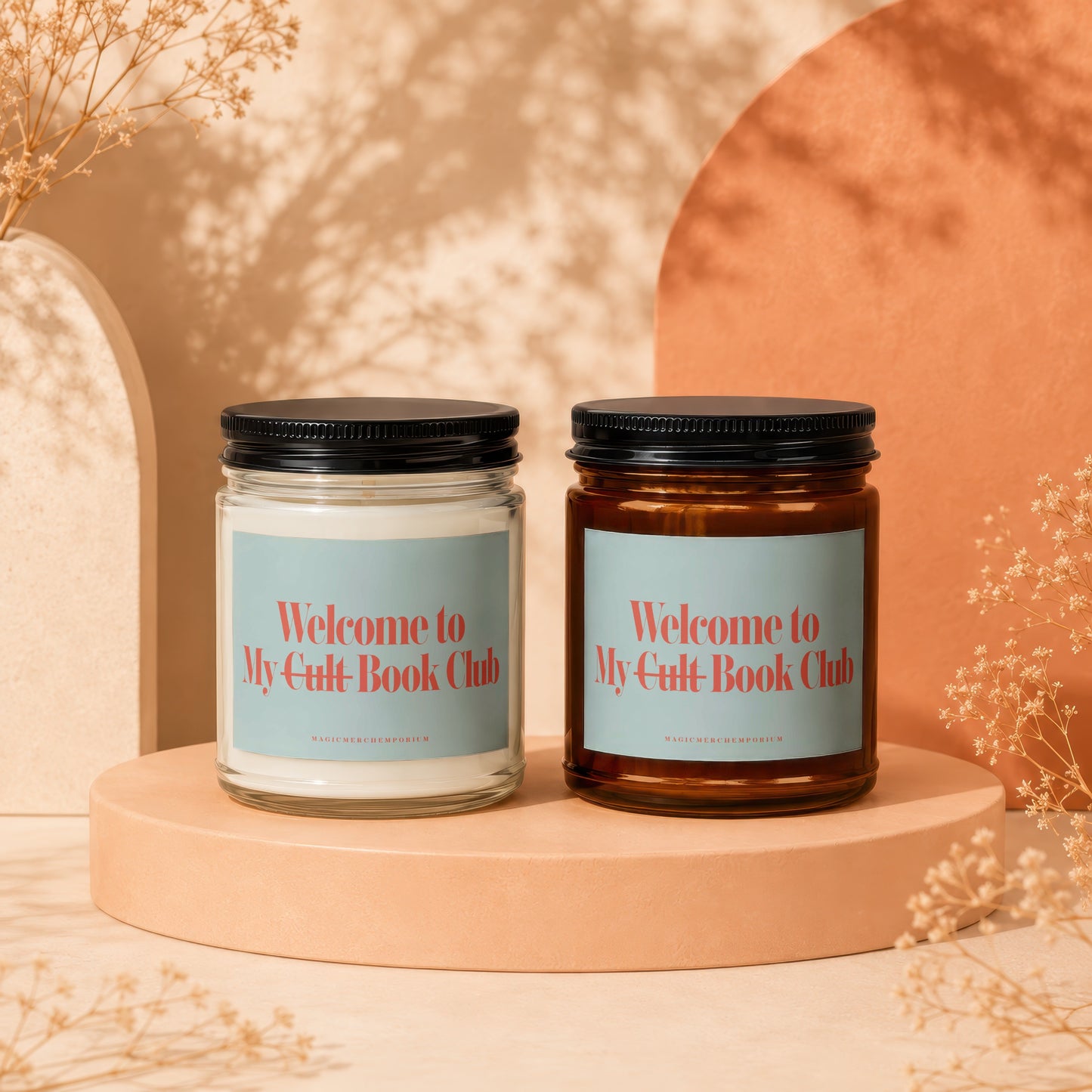 Two candles with "Welcome to My Cult Book Club" text on labels.