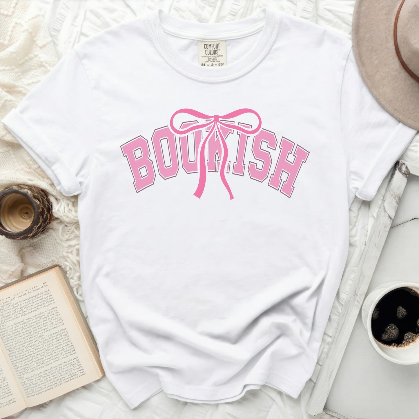 White t-shirt with "BOUKISH" graphic in pink lettering.