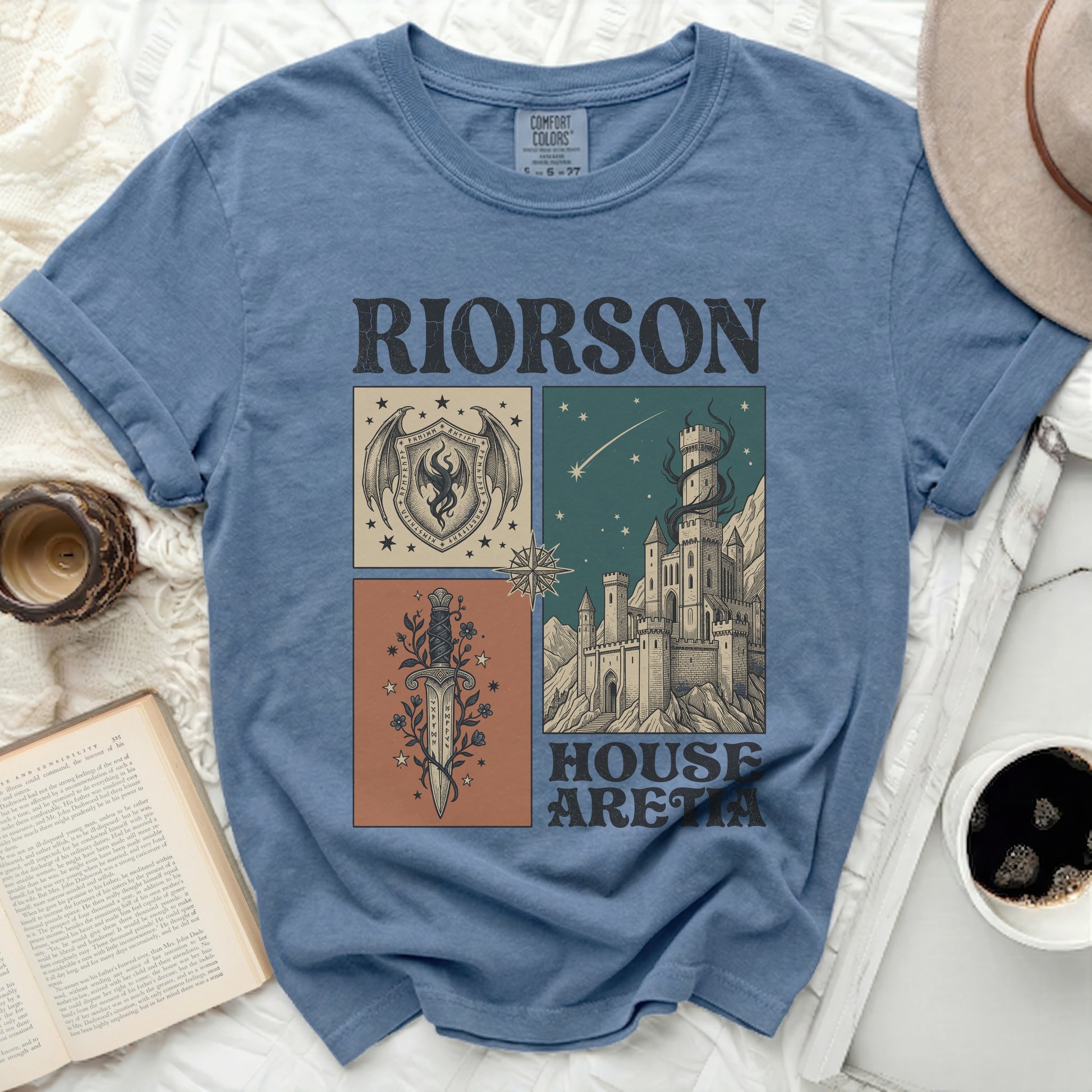 Blue t-shirt with "RIORSON HOUSE ARETIA" text and medieval castle design.