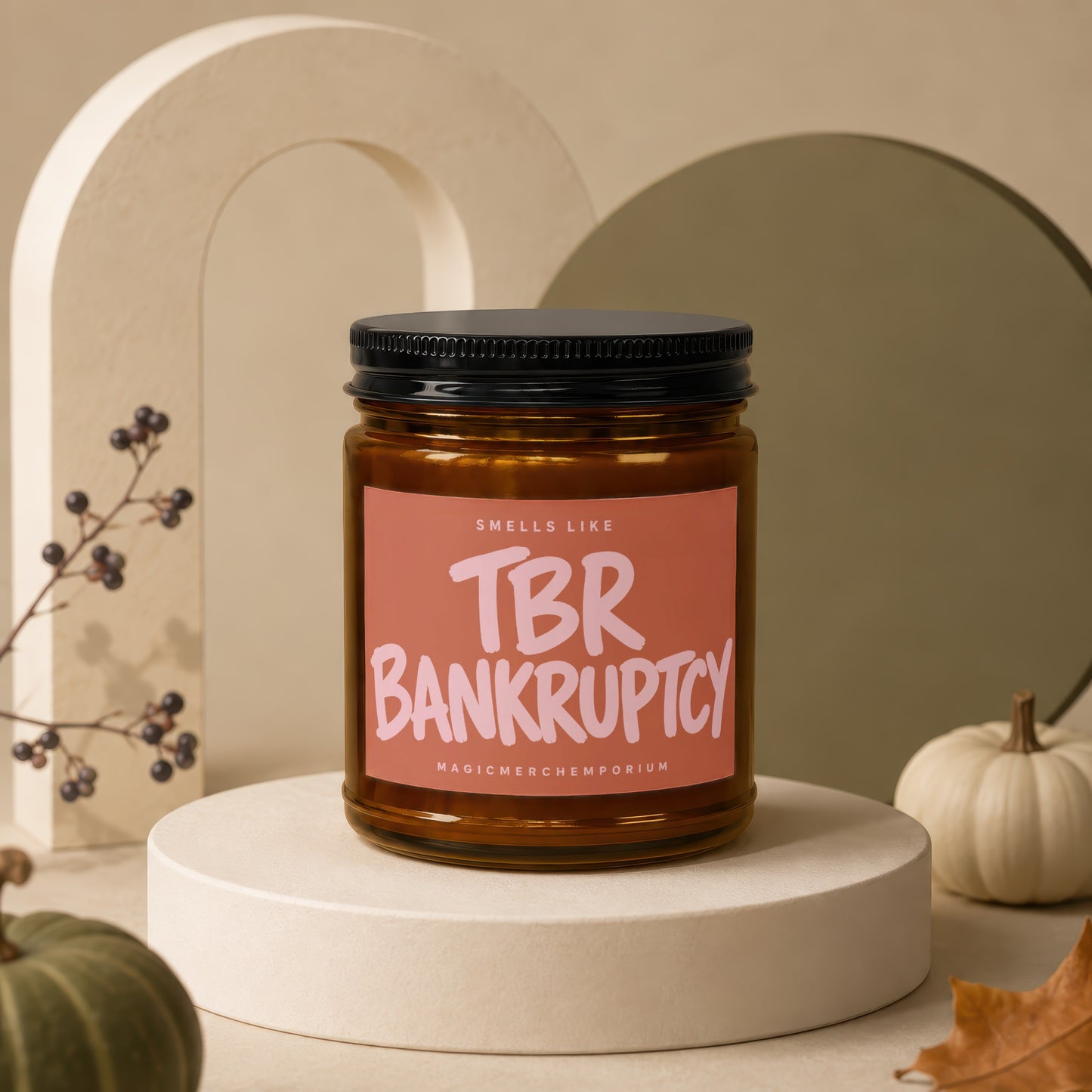 Brown candle with pink label reading "TBR BANKRUPTCY."