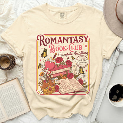 Cream t-shirt with "Romantasy Book Club" graphic featuring books, crown, and butterflies.