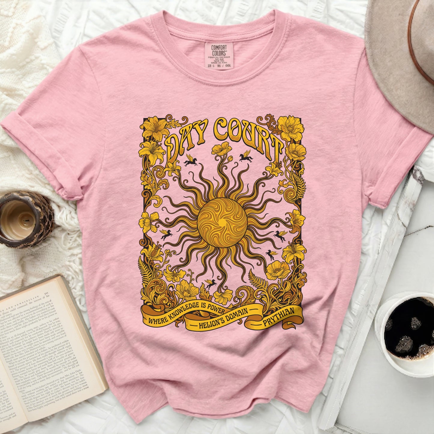 Pink t-shirt with sun, floral border, and text "Day Court" and "Prythian".