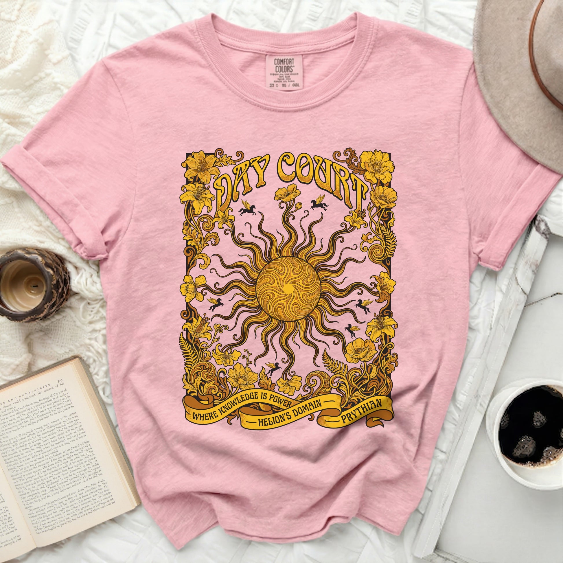Pink t-shirt with sun, floral border, and text "Day Court" and "Prythian".