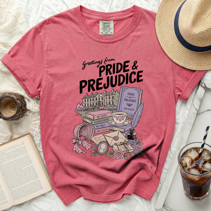 Pink t-shirt with "Greetings from Pride & Prejudice" and literary illustrations.