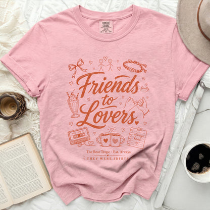 Pink t-shirt with "Friends to Lovers" graphic and mixtape design.
