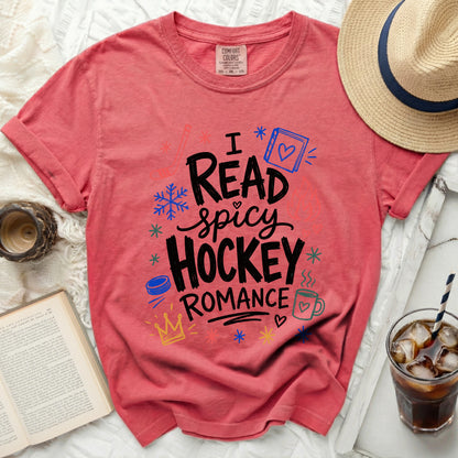 Coral t-shirt with "Read Spicy Hockey Romance" text and hockey graphics.