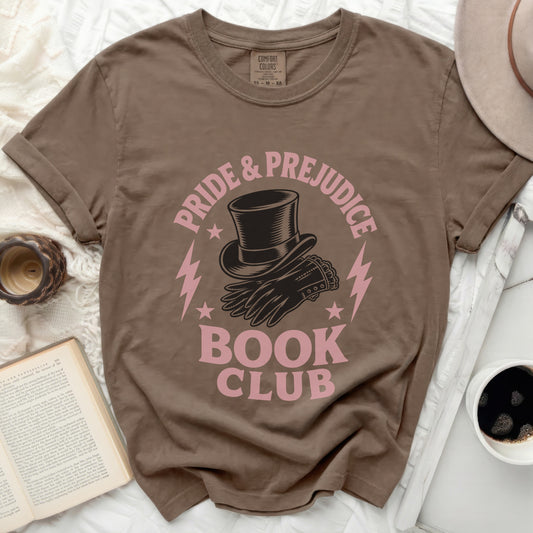 Brown t-shirt with "Pride & Prejudice Book Club" graphic and vintage hat.