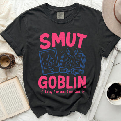 Black t-shirt with "SMUT GOBLIN Spicy Romance Book Club" text and illustrations.