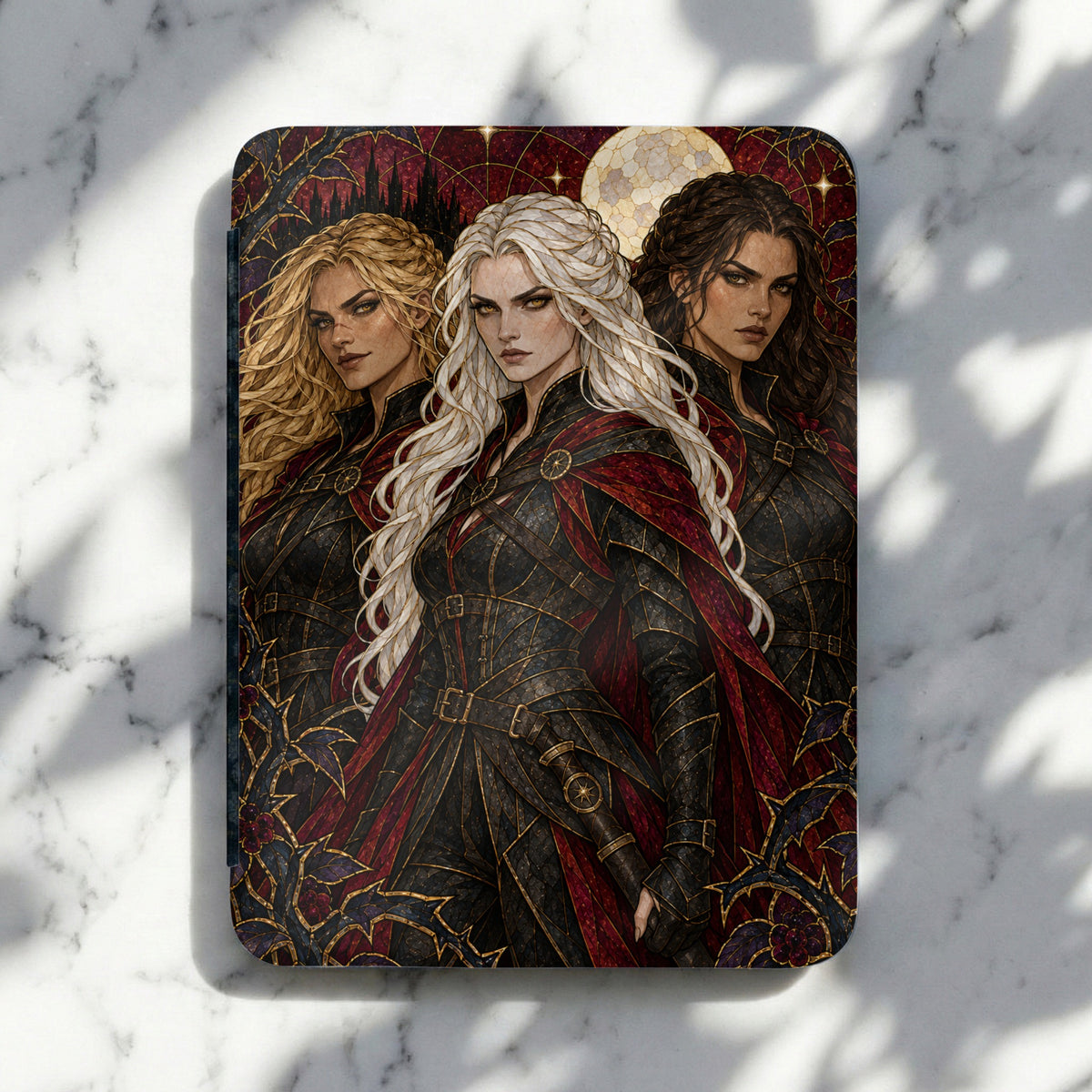Three women in ornate black and red armor stand before a moonlit, gothic-inspired background.