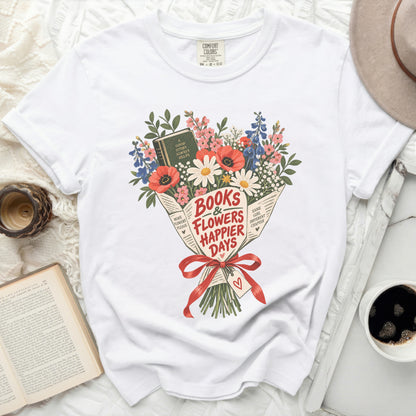 White t-shirt with "Books & Flowers Happier Days" floral bouquet graphic.