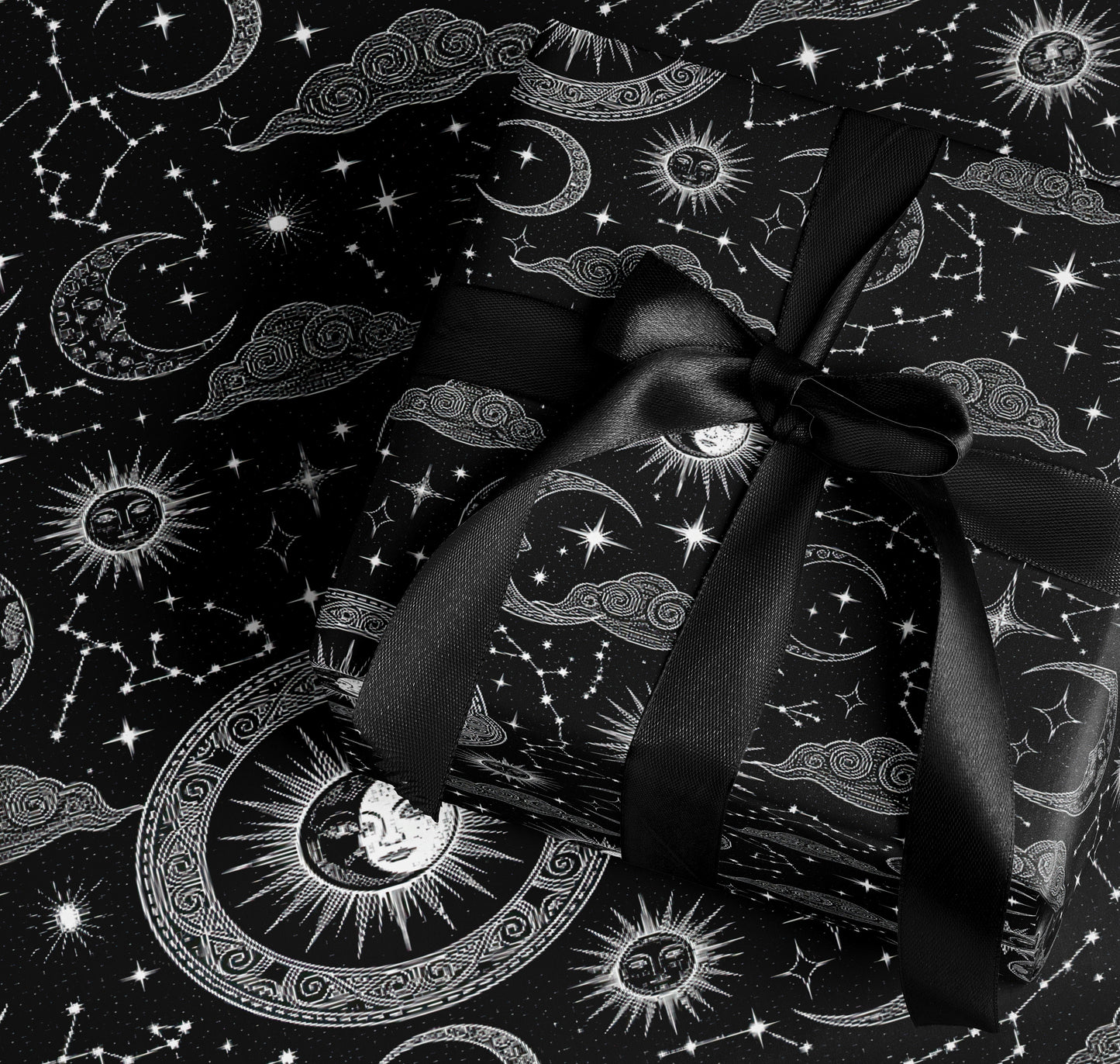 Celestial Black Gift Wrap with Suns Moons Stars Patterns