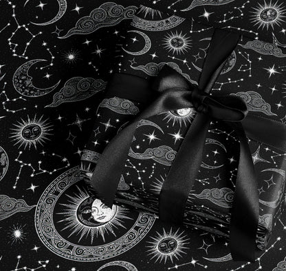 Celestial Black Gift Wrap with Suns Moons Stars Patterns