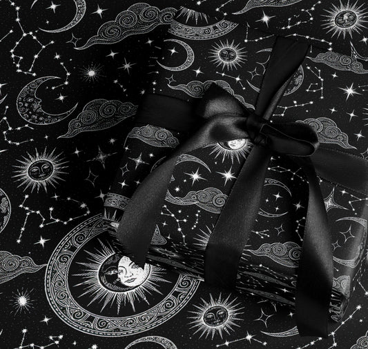 Celestial Black Gift Wrap with Suns Moons Stars Patterns