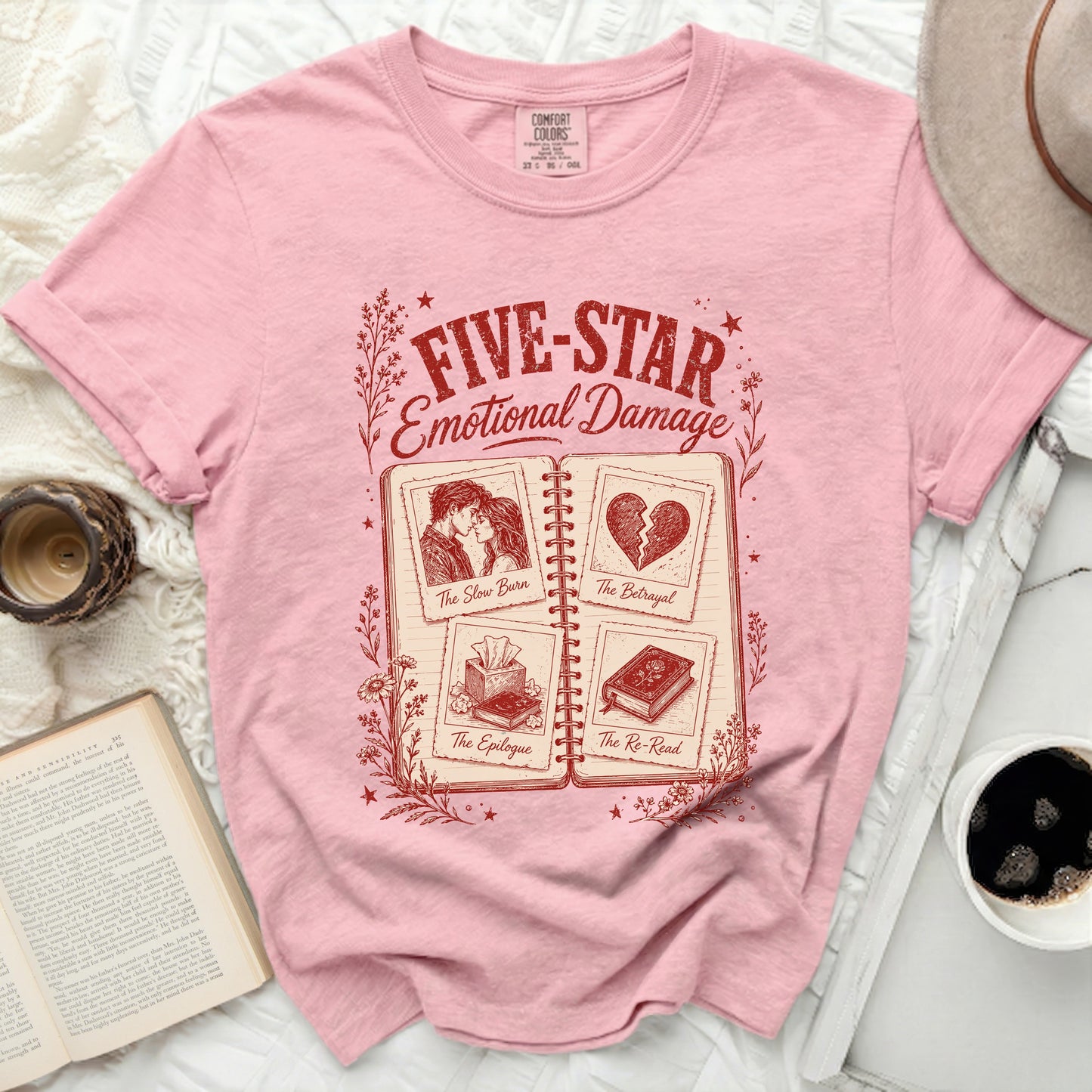 Pink t-shirt with "Five-Star Emotional Damage" and book chapter titles.