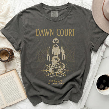 Dark grey t-shirt with gold graphic of a tower, compass, and "Dawn Court The Palace Est. Prythian".