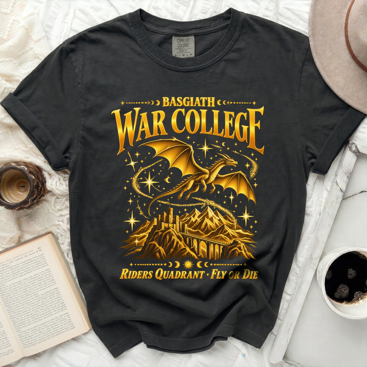 Black t-shirt with gold dragon, castle, mountains, and "Basgiath War College" text.