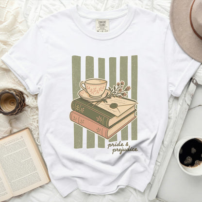 White t-shirt with "Pride & Prejudice" literary graphic of books and teacup.