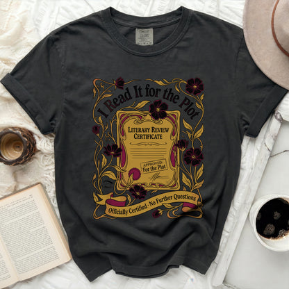 Dark gray t-shirt with "I Read It for the Plot" literary review certificate design.