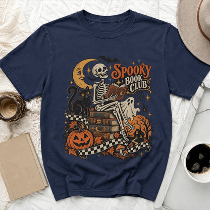Skeleton reading a book with "Spooky Book Club" text and Halloween elements.