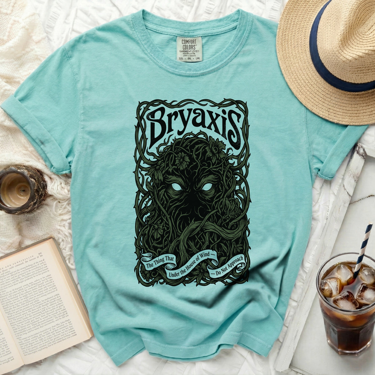 Teal t-shirt with "Bryaxis" and a mythical creature graphic.