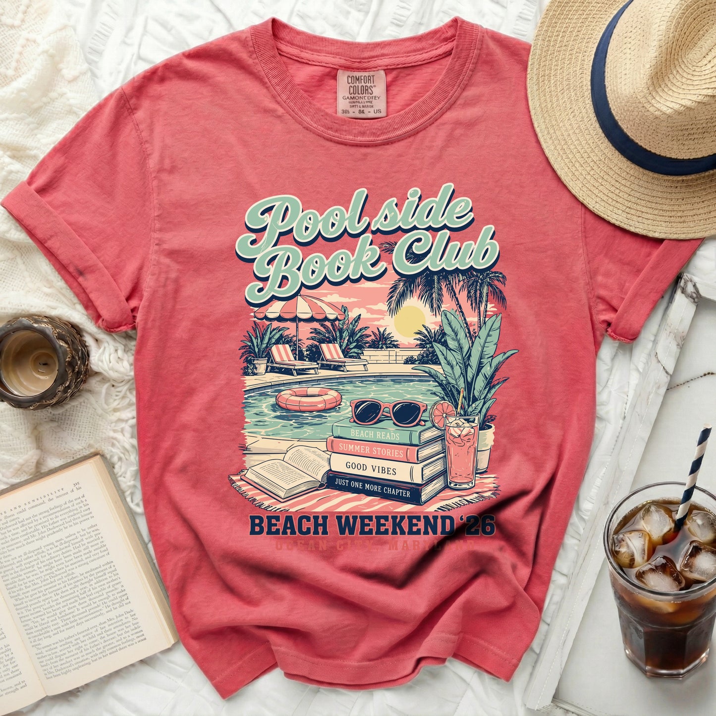 Red t-shirt with "Pool side Book Club" graphic and summer scene.
