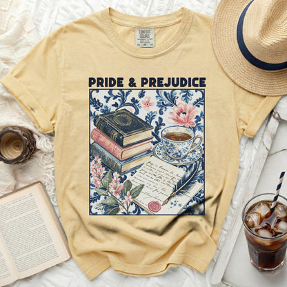 Yellow t-shirt with Pride and Prejudice books, teacup, and handwritten letter graphic.