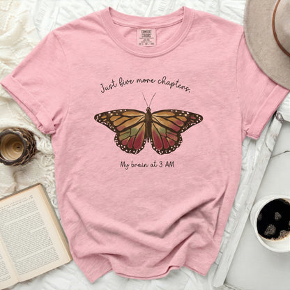 Pink Comfort Colors t-shirt with butterfly graphic and text "Just five more chapters. My brain at 3 AM."