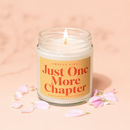 Scented candle in a jar with text "Smells Like Just One More Chapter".